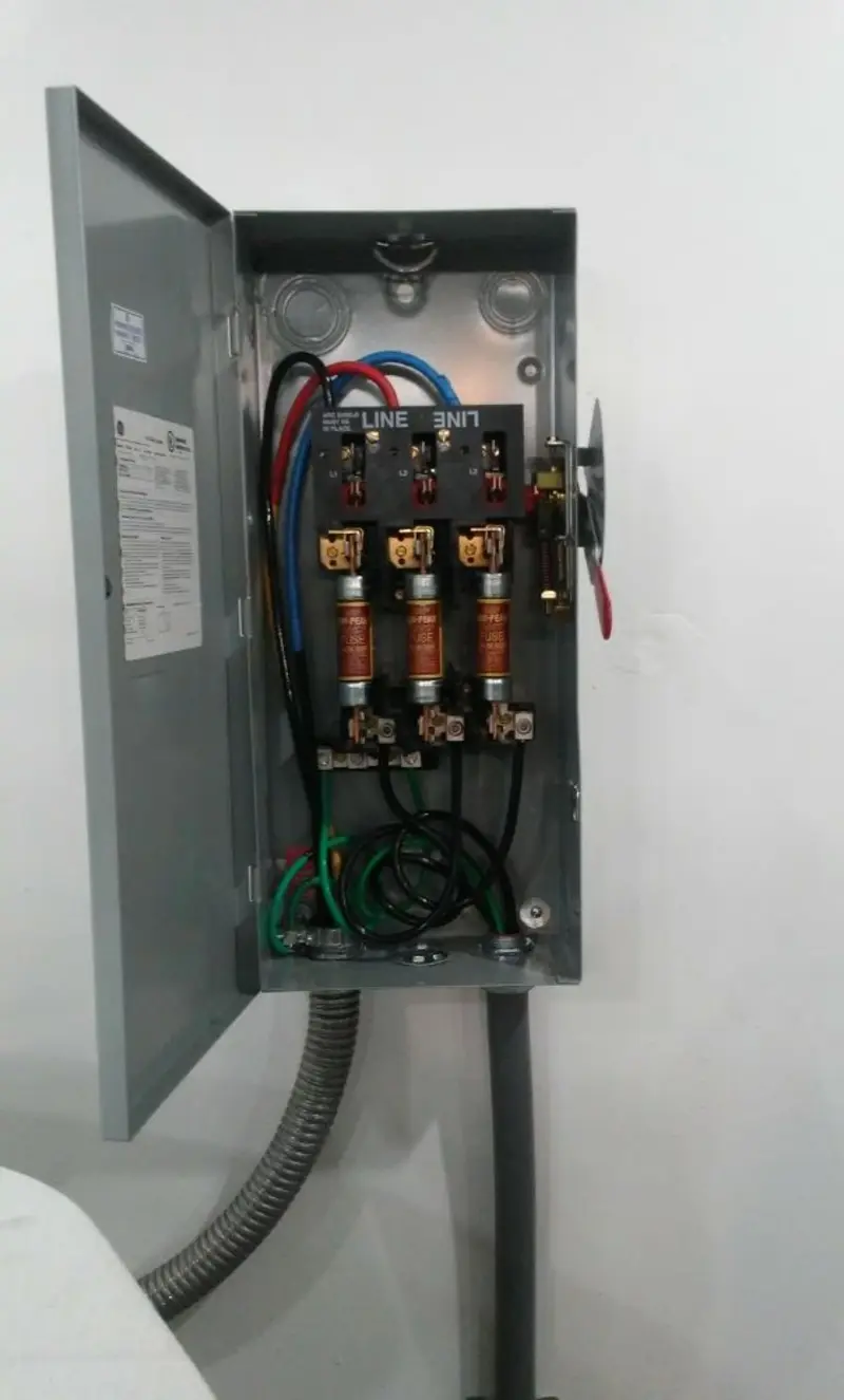 Three-phase disconnect switch installed for Smoke Detector Installation in Sealy